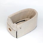 Beige pet bed with a zipper on a white background