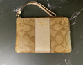 Coach Corner Zip Wristlet – Signature Canvas with Gold Stripe