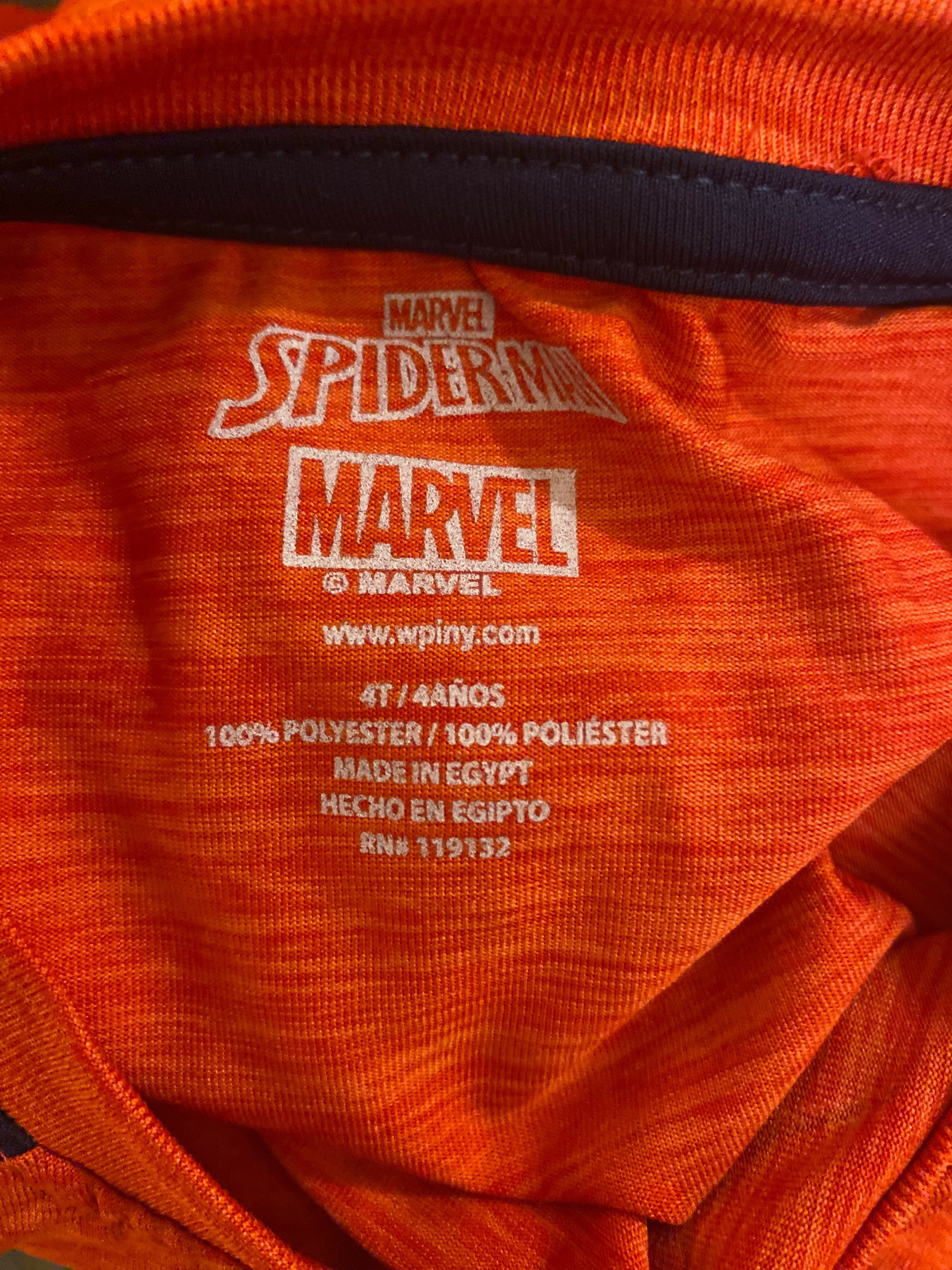 Marvel Spider-Man shirt interior tag showing size 4T, 100% polyester, made in Egypt