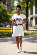 African American Woman Wearing Peace and Progress T-Shirt Dress with Tennis Shoes