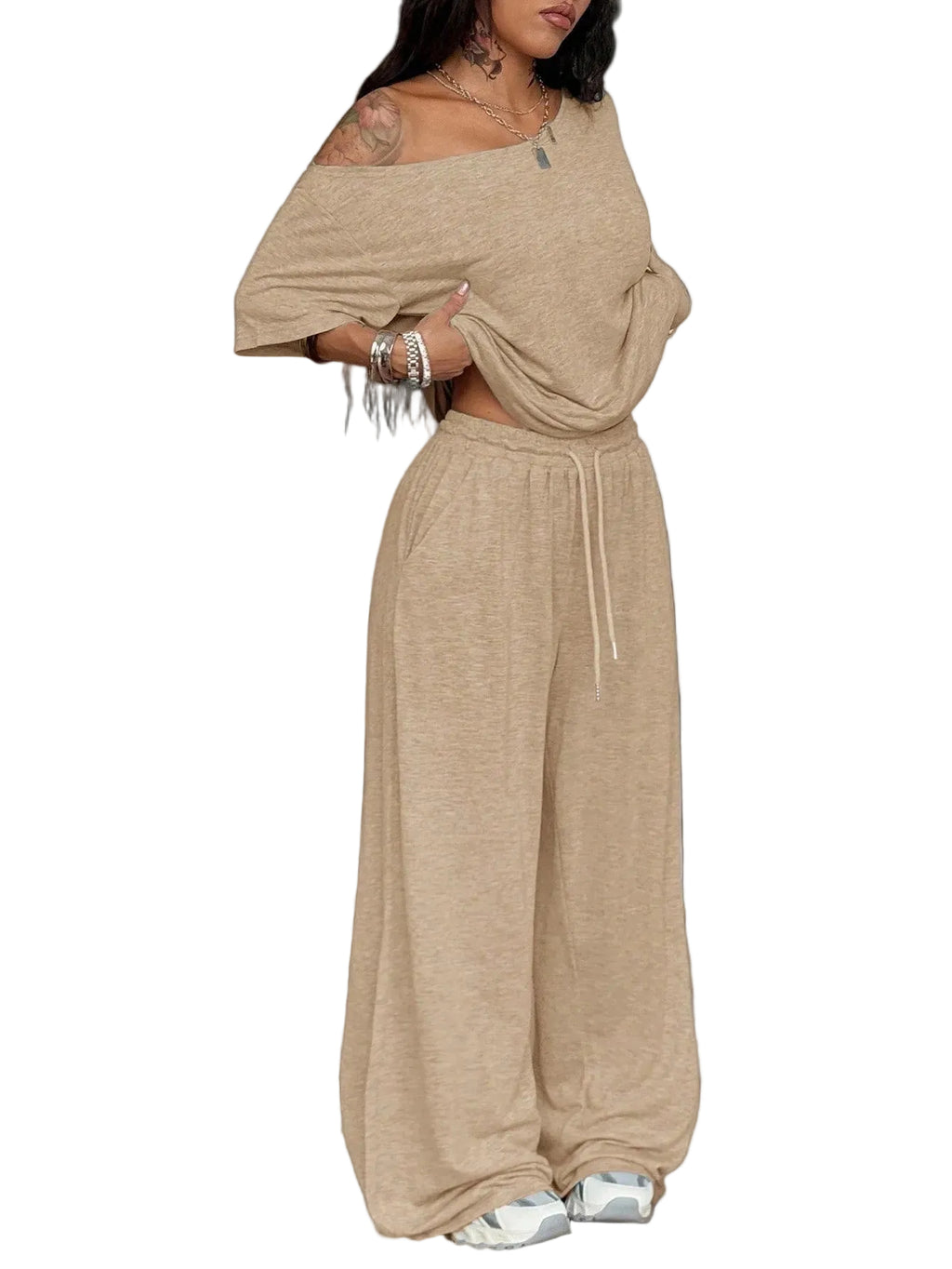 Woman wearing a beige off-shoulder top and wide-leg pants with text '2 Pack' on a white background.