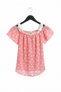 Pink heart print off-shoulder puff sleeve top on white background