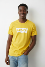 Young Black Man in Yellow Levi's Tee - White Logo